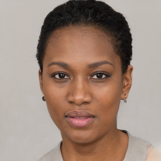 Neutral black young-adult female with short  black hair and brown eyes