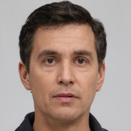 Neutral white adult male with short  brown hair and brown eyes