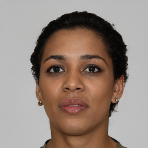 Neutral latino young-adult female with short  black hair and brown eyes