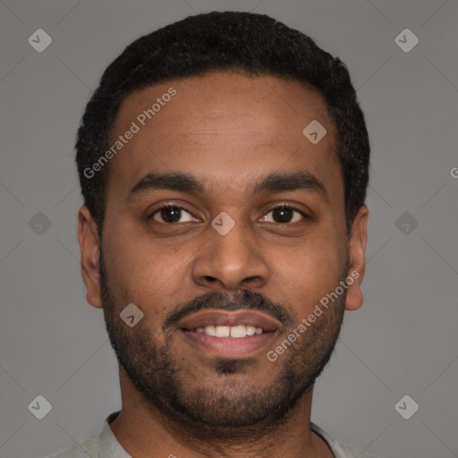 Joyful latino young-adult male with short  black hair and brown eyes