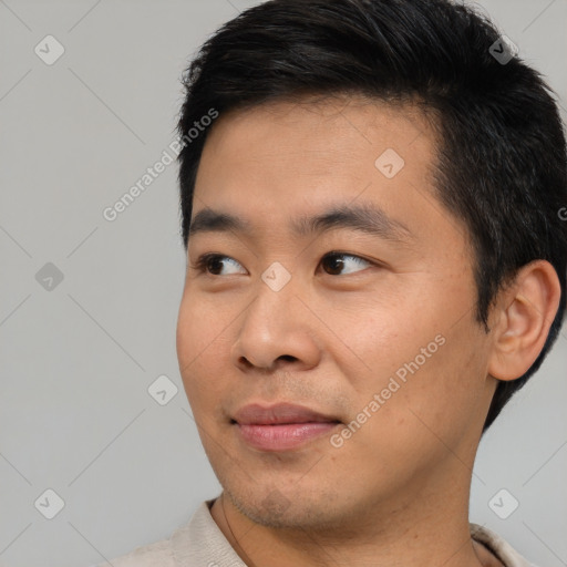 Neutral asian young-adult male with short  black hair and brown eyes