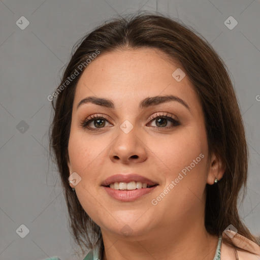 Joyful white young-adult female with medium  brown hair and brown eyes