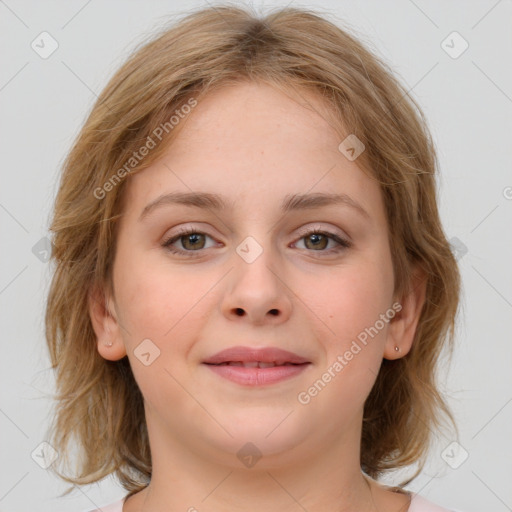 Joyful white young-adult female with medium  brown hair and blue eyes