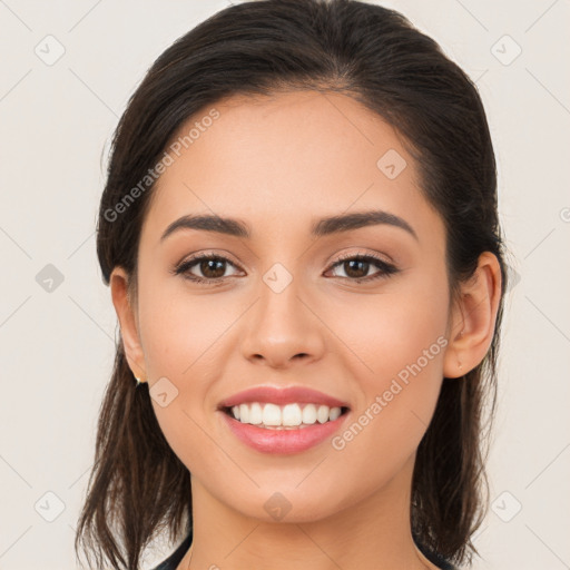 Joyful white young-adult female with long  brown hair and brown eyes