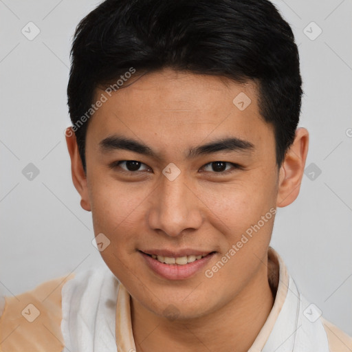 Joyful latino young-adult male with short  brown hair and brown eyes