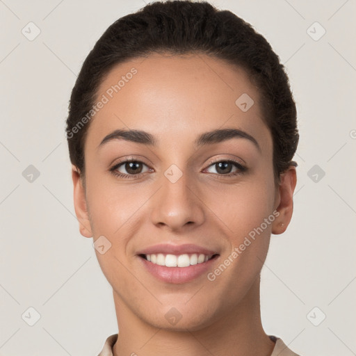 Joyful white young-adult female with short  brown hair and brown eyes