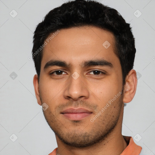 Neutral latino young-adult male with short  black hair and brown eyes