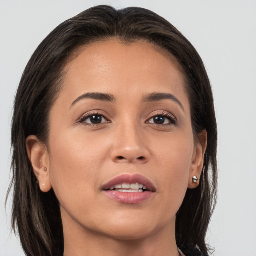 Joyful white young-adult female with medium  brown hair and brown eyes