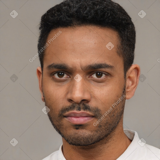 Neutral latino young-adult male with short  black hair and brown eyes