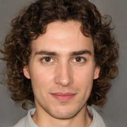 Joyful white young-adult male with medium  brown hair and brown eyes