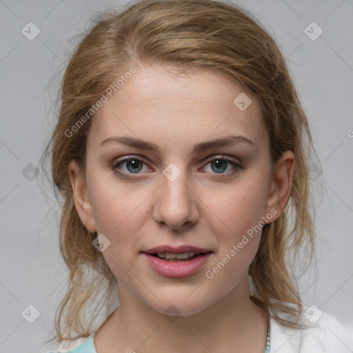 Joyful white young-adult female with medium  brown hair and blue eyes