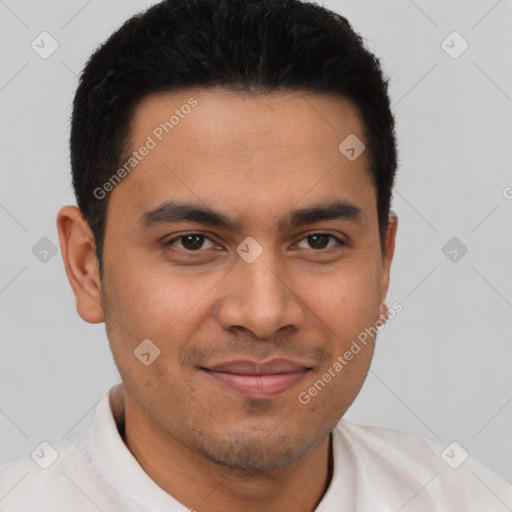 Joyful latino young-adult male with short  brown hair and brown eyes