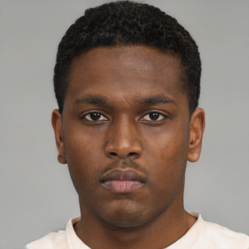 Neutral black young-adult male with short  brown hair and brown eyes
