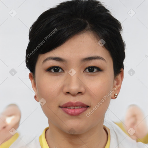 Joyful asian young-adult female with short  brown hair and brown eyes