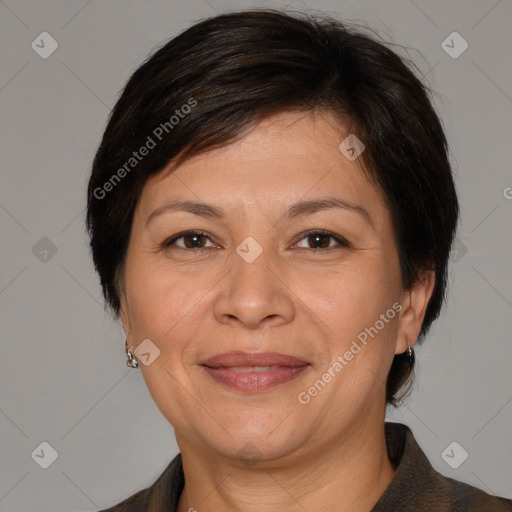 Joyful white adult female with medium  brown hair and brown eyes