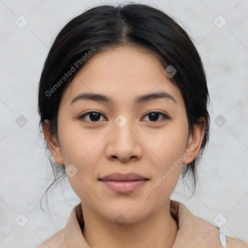 Joyful latino young-adult female with medium  brown hair and brown eyes