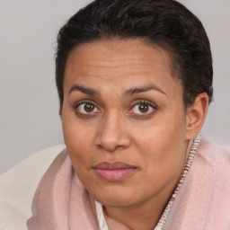Joyful white adult female with short  brown hair and brown eyes