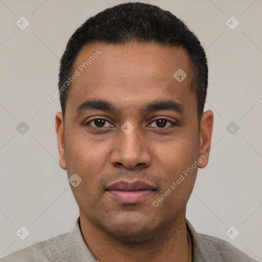 Neutral latino young-adult male with short  black hair and brown eyes