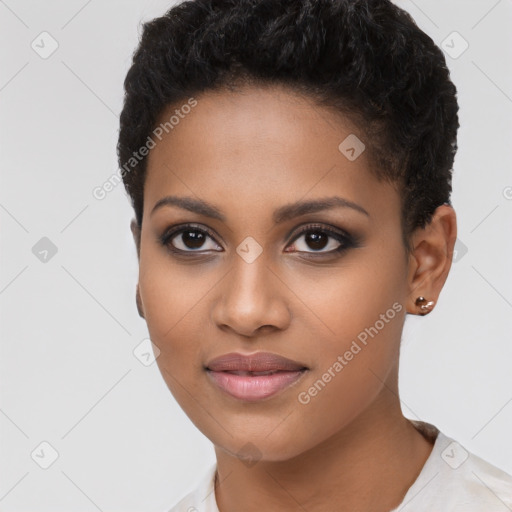 Joyful black young-adult female with short  brown hair and brown eyes