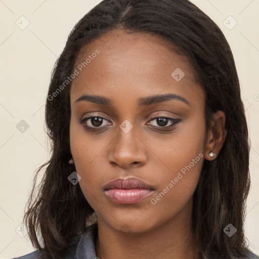 Neutral black young-adult female with long  brown hair and brown eyes