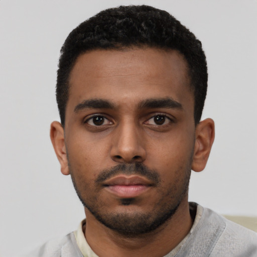 Neutral black young-adult male with short  black hair and brown eyes