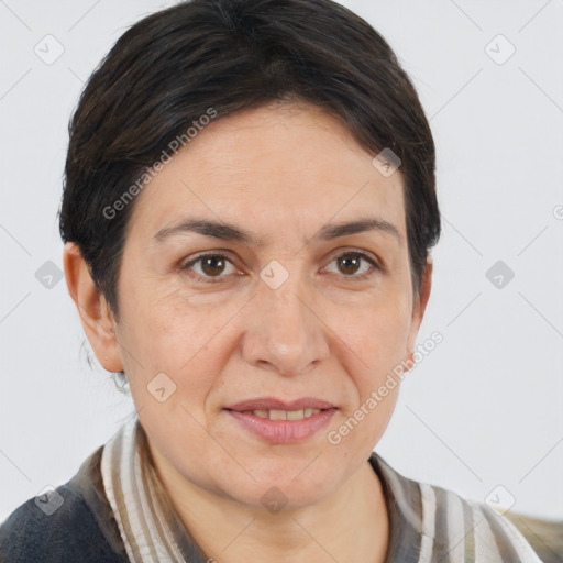 Joyful white adult female with medium  brown hair and brown eyes