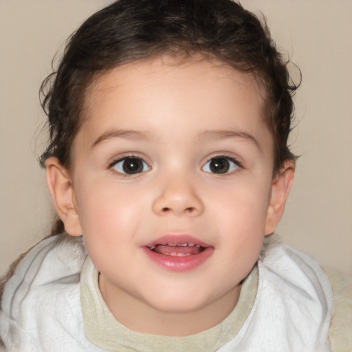 Joyful white child female with short  brown hair and brown eyes