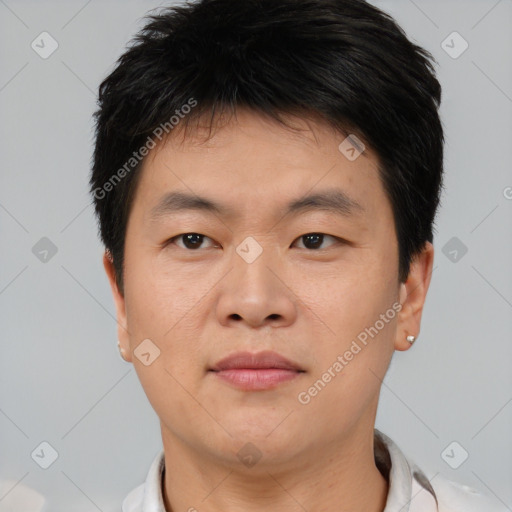 Neutral asian young-adult male with short  brown hair and brown eyes