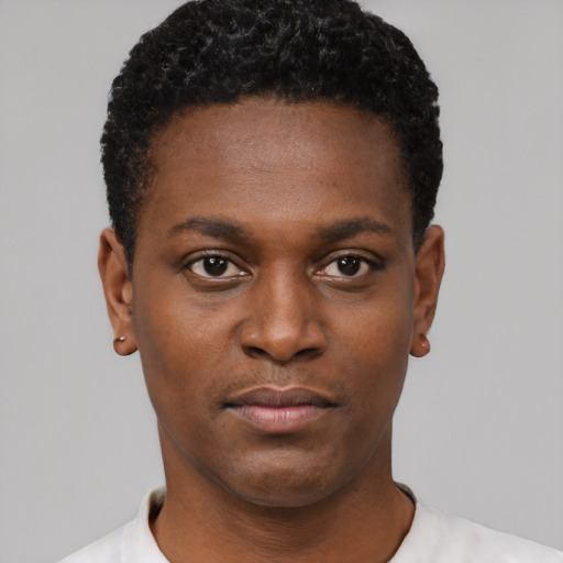 Neutral black young-adult male with short  black hair and brown eyes