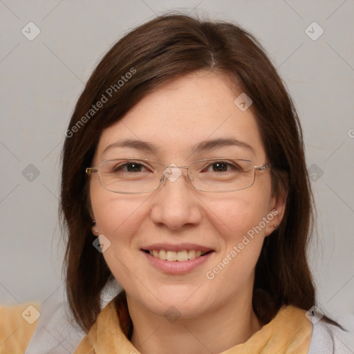 Joyful white adult female with medium  brown hair and brown eyes