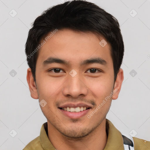 Joyful asian young-adult male with short  brown hair and brown eyes