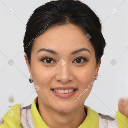 Joyful asian young-adult female with short  brown hair and brown eyes