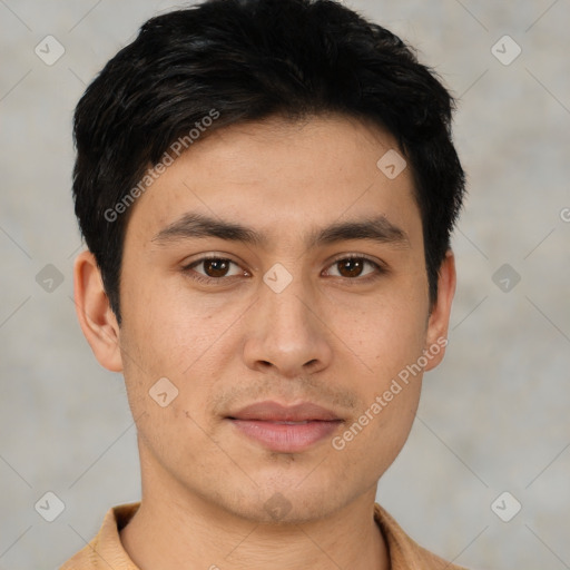 Joyful asian young-adult male with short  black hair and brown eyes