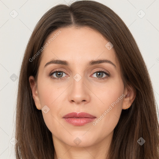 Joyful white adult female with long  brown hair and brown eyes