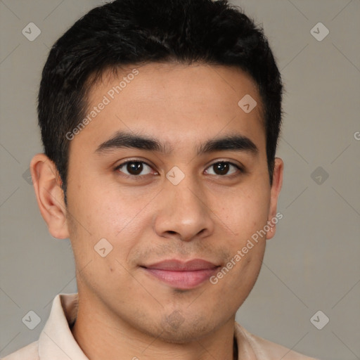 Joyful latino young-adult male with short  brown hair and brown eyes