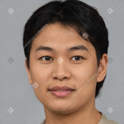 Joyful asian young-adult male with short  brown hair and brown eyes