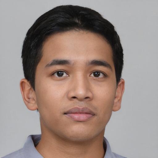 Neutral asian young-adult male with short  black hair and brown eyes
