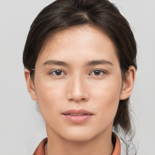 Neutral white young-adult female with medium  brown hair and brown eyes