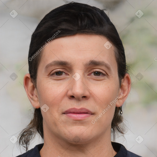 Joyful white young-adult male with medium  brown hair and grey eyes