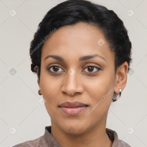 Joyful latino young-adult female with short  black hair and brown eyes