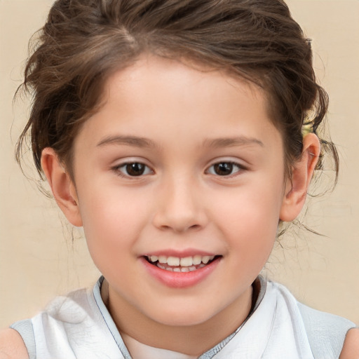 Joyful white child female with short  brown hair and brown eyes