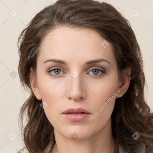 Neutral white young-adult female with long  brown hair and brown eyes