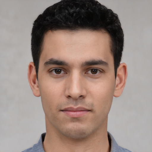 Neutral white young-adult male with short  black hair and brown eyes