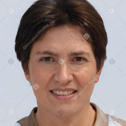 Joyful white adult female with short  brown hair and brown eyes