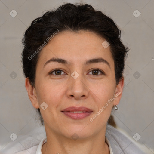 Joyful white adult female with short  brown hair and brown eyes