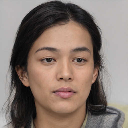 Neutral asian young-adult female with medium  brown hair and brown eyes
