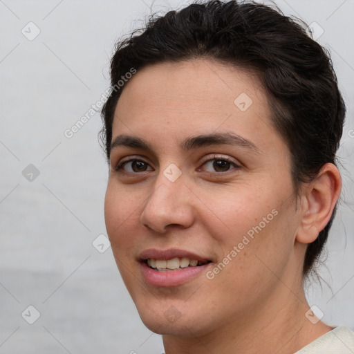 Joyful white young-adult female with short  brown hair and brown eyes