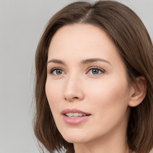 Neutral white young-adult female with medium  brown hair and brown eyes