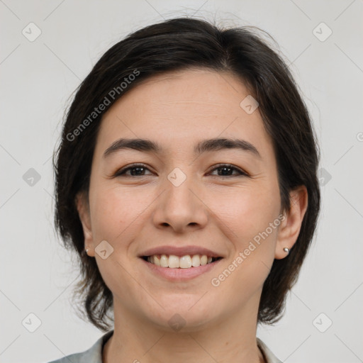 Joyful white young-adult female with medium  brown hair and brown eyes