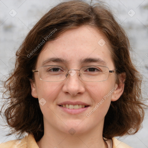 Joyful white adult female with long  brown hair and brown eyes